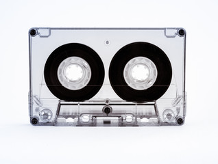 Old audio cassette with tape. Photo closeup.
