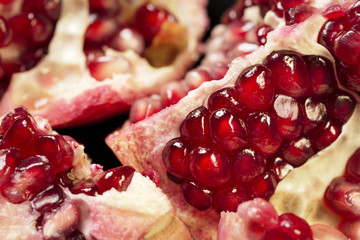 ruby juicy pomegranate grains closeup