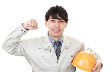 ガッツポーズの作業員
