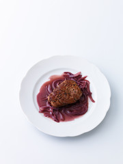 Steak with onions and red wine sauce