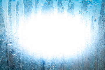 Window frozen at low temperature (in the cold). Formed ice and frost.
