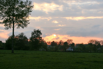 Fototapeta na wymiar farm sunset