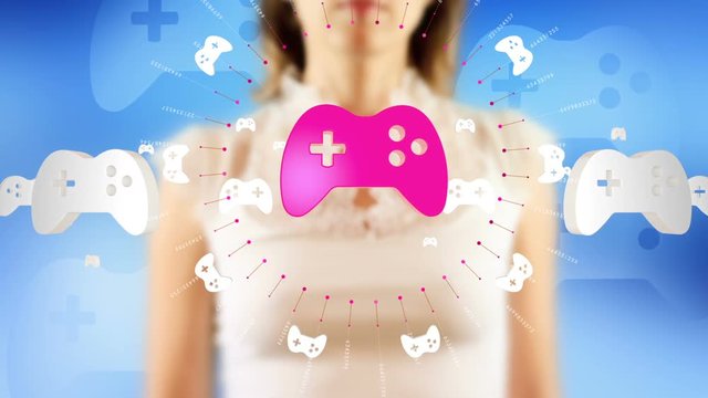 Young female pressing the screen then gamepad symbol appearing. Futuristic touch screen concept.
