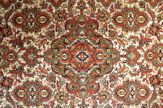 old carpet with national oriental pattern