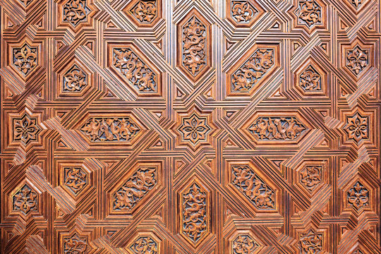 Background of arabic decoration on carved wood.