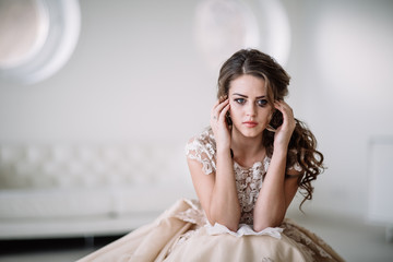 portrait of the bride crying, sadness, streaks of ink. Natural light