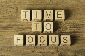 Time to focus text on wooden cubes