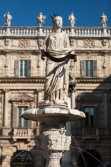 Ancient Statue of Fountain Madonna Verona on Piazza delle Erbe, Italy