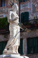 Ancient Statue of Fountain Madonna Verona on Piazza delle Erbe, Italy