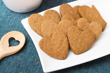 Heart shaped cookies on blue background