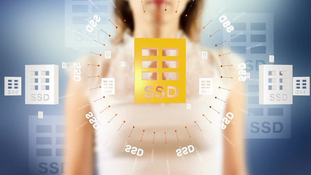 Young female pressing the screen then ssd disk symbol appearing. Futuristic touch screen concept.