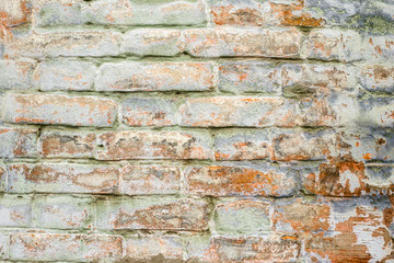 Weathered texture of stained old dark brown and red brick wall background