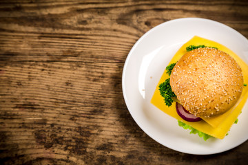 Sandwich with cheese in dish on table