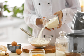 Cooking concept. Professional confectioner making delicious dessert, closeup