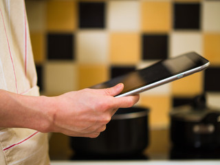 using digital tablet in kitchen