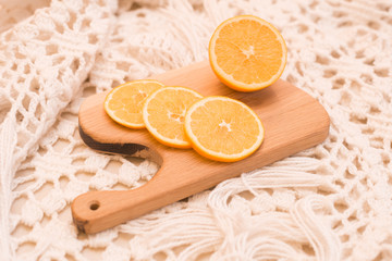orange on a cutting board cut in circles
