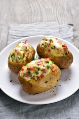 Baked potato with bacon and cheese