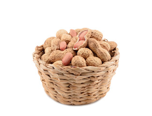 Peanuts in a basket isolated on white