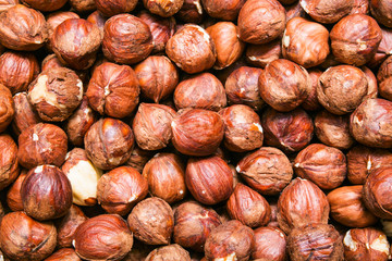 Peeled hazelnuts, cobnuts background or texture