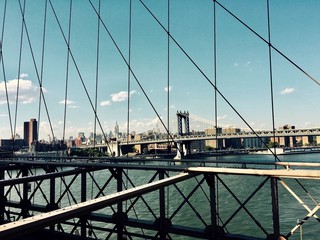 Fototapeta premium Manhattan bridge from the Brooklyn bridge view in vintage style