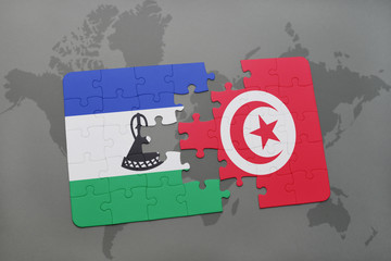 puzzle with the national flag of lesotho and tunisia on a world map