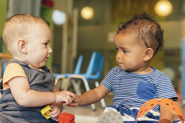 Babys playing together. - 131681919