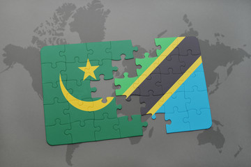 puzzle with the national flag of mauritania and tanzania on a world map