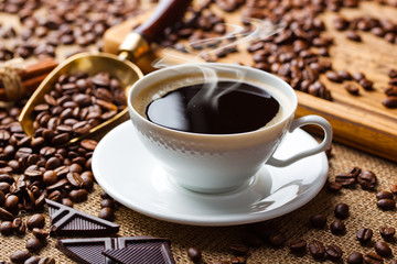 Black coffee on old background