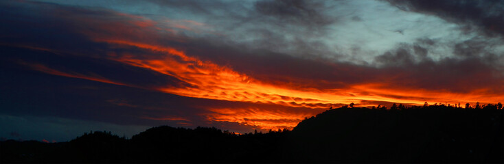 Sunset Over Cherokee Park - Bright orange sunset over Cherokee Park Colorado in the Rocky Mountains