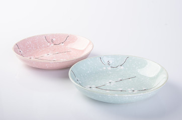 plate or flowers on plate painted by hand on background.