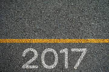 Happy New year 2017 paint on the asphalt road