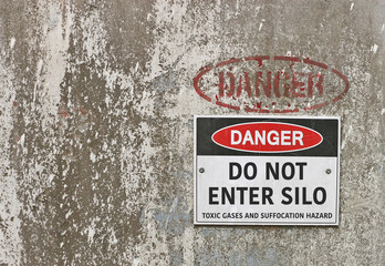 red, black and white Danger, Do Not Enter Silo warning sign