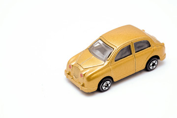 Car toy gold on a white background