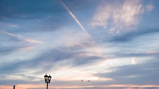 Vibrant Sunset Sky at Louis Armstrong New Orleans International Airport at Dusk from a Wide Angle with Blue and Orange Colors