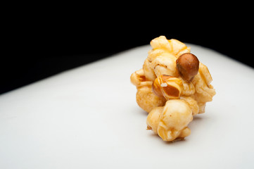 caramel popcorn on a white background