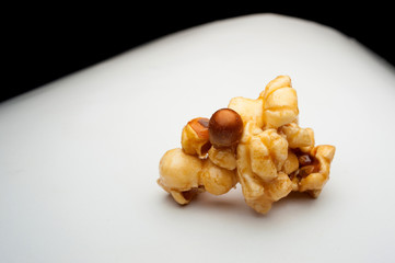 caramel popcorn on a white background