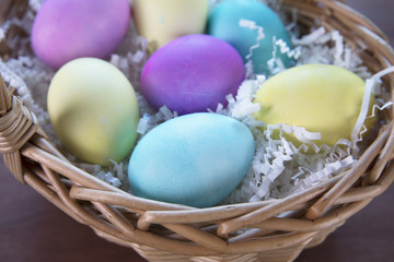 Fototapeta na wymiar Colorful Easter Eggs in Basket