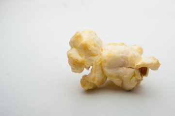 caramel popcorn on a white background