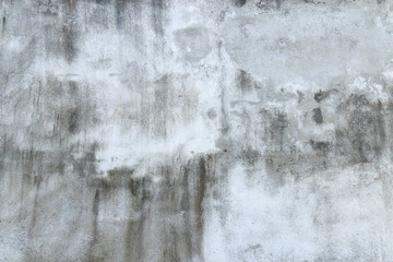 Fototapeta na wymiar Traces of time on wall. Old concrete background. Faded walls. Abstract textures.