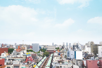Fototapeta premium Business and culture concept - panoramic modern city skyline bird eye aerial view with Sensoji-ji Temple shrine - Asakusa district under morning blue sky in Tokyo, Japan