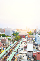 Fototapeta premium Asia Business concept for real estate and corporate construction - panoramic modern cityscape building bird eye aerial view of Sensoji shrine under sunrise and morning blue bright sky in Tokyo, Japan