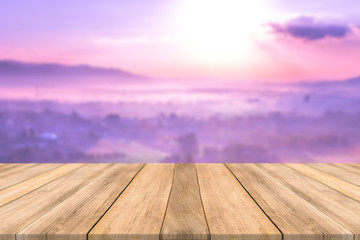 Empty wooden table space platform and blurred Sky mountains sunsets Fog background for product display montage