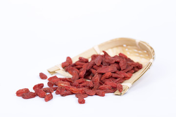 Dried Goji Berries also known as Wolfberry on the white background