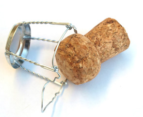 champagne wine botle cork against white background