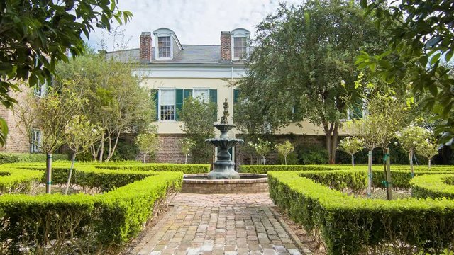 Old Ursuline Convent the Oldest Building in New Orleans Louisiana LA with the Exterior Garden and Water Feature on a Sunny Day