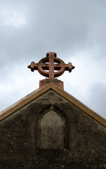 Cross symbol on roof of church