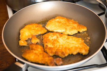 fried pork chops in the pan