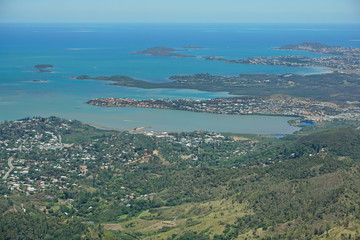 Obraz premium Aerial view, Boulary bay, islands and peninsula of Tina, Noumea, southwest coast of Grande Terre, New Caledonia, south Pacific ocean 