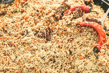 Pilaf- a Middle Eastern or Indian dish of rice (or sometimes wheat) cooked in stock with spices,...