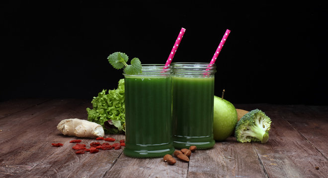 Healthy green smoothie and ingredients - superfoods, detox, diet, health, vegetarian food concept